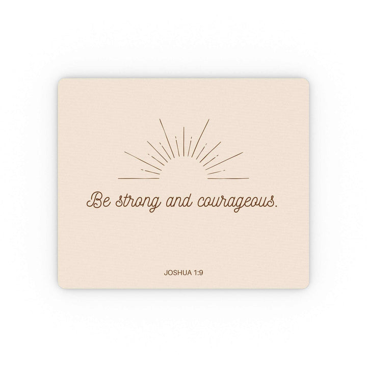 Joshua 1:9 mouse pad with "Be strong and courageous" inspirational verse and sunburst design on beige background, durable and non-slip surface.