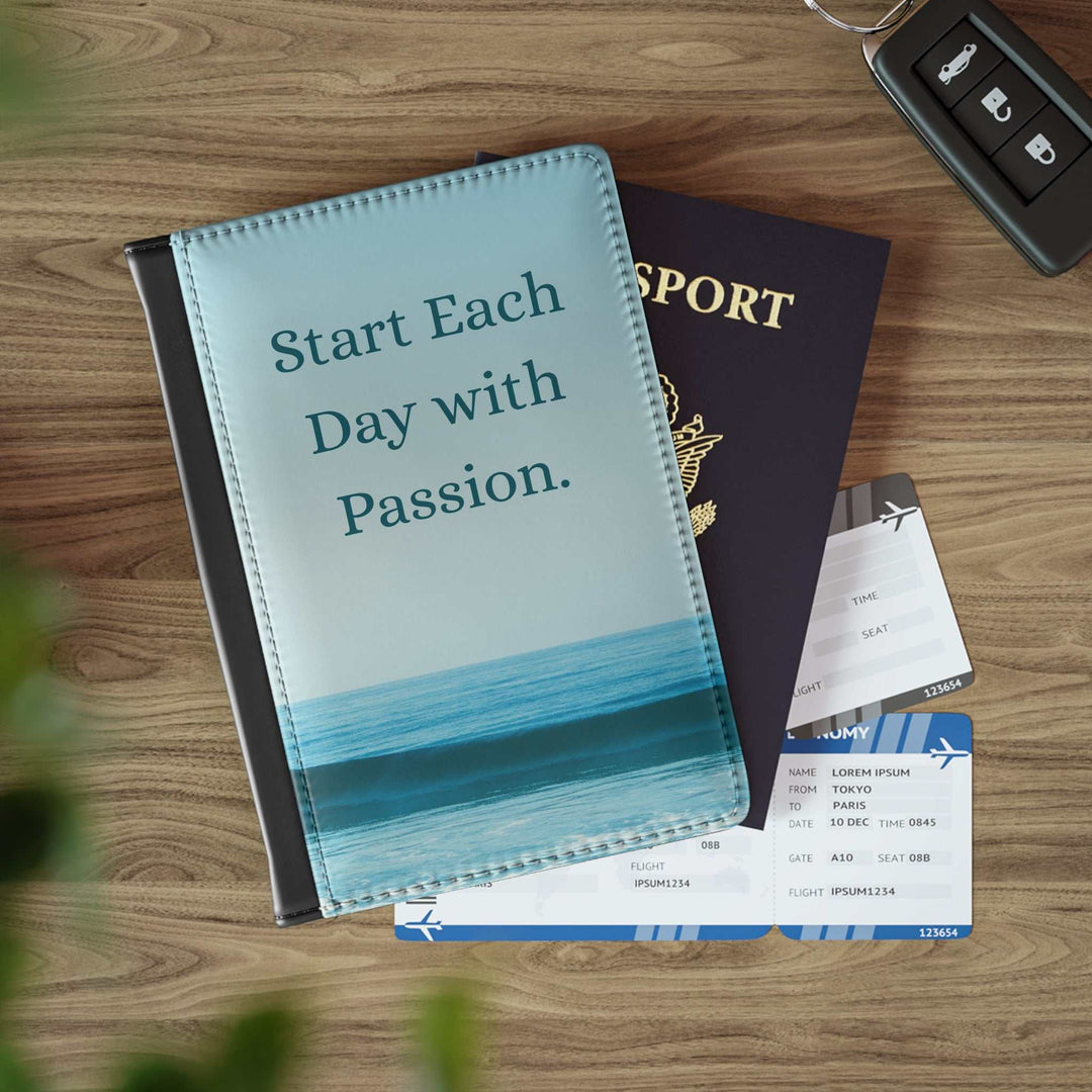 Blue and black Live with Passion Passport Cover with inspirational quote, beside a U.S. passport and flight tickets on a wooden surface