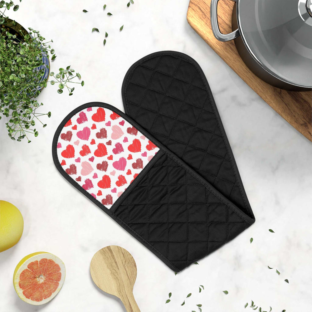 Love Design Oven Mitts with red heart pattern, black quilted cotton back