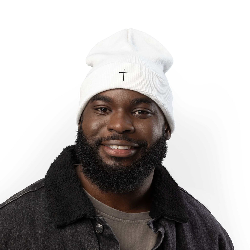 Man wearing a white Faith Knit Beanie with a small embroidered cross