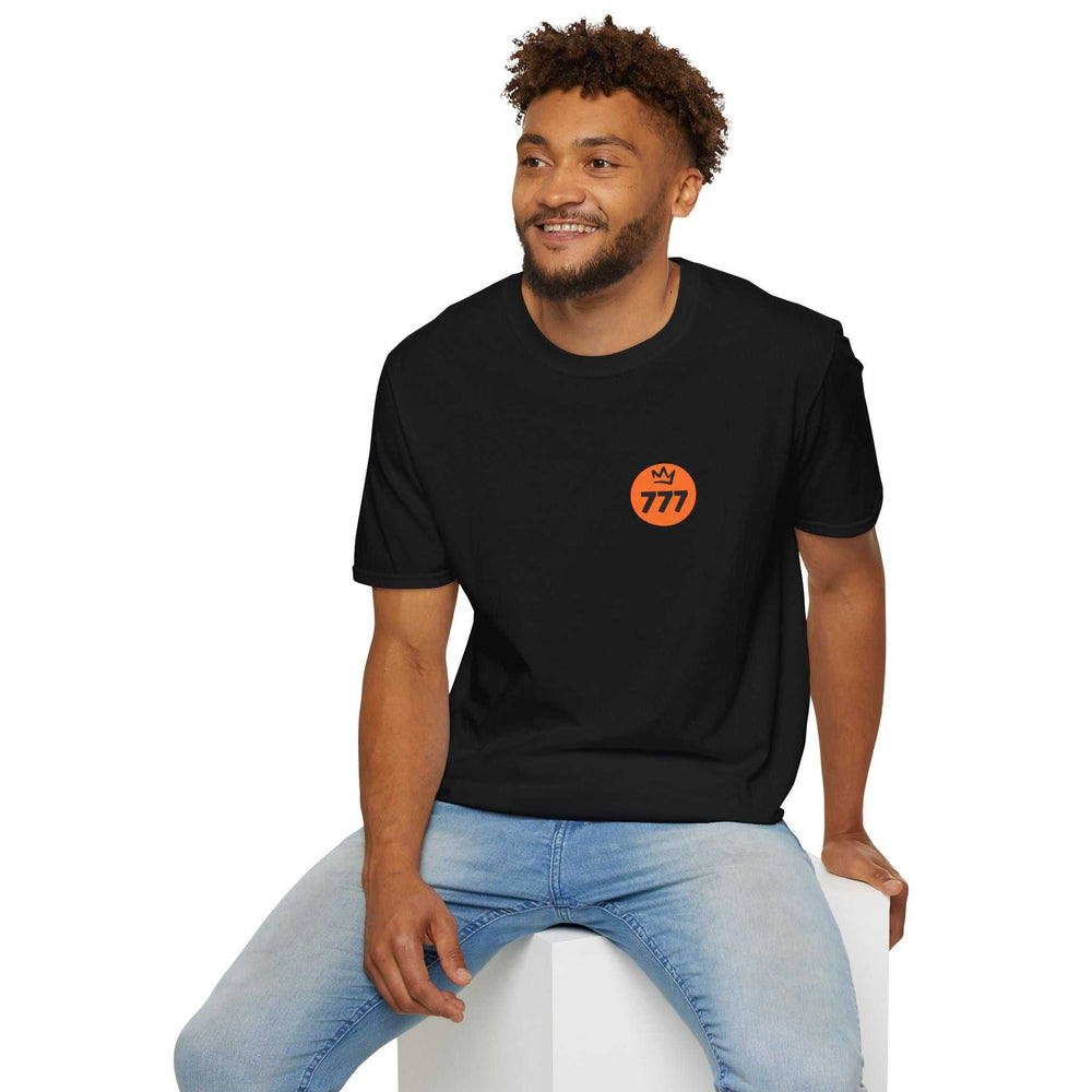 Man wearing a black Divine Perfection T-shirt with orange 777 logo, paired with light blue jeans.