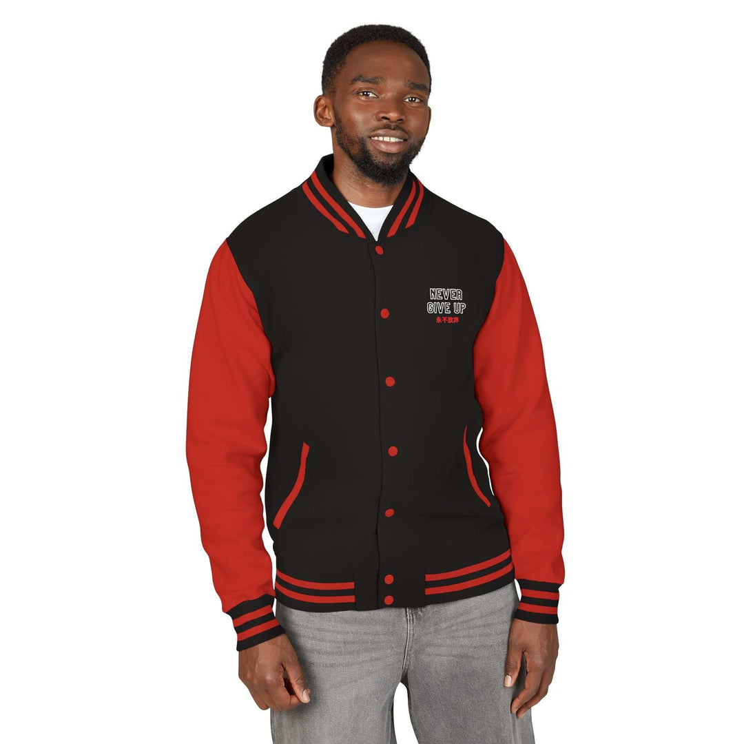 Man wearing a black and red Never Give Up jacket with button front and striped cuffs, made of cotton and polyester blend.