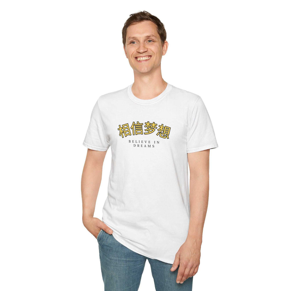 White Believe In Dreams t-shirt with inspirational text in English and Chinese, worn by smiling man in casual jeans.