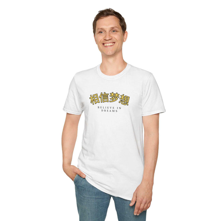 White Believe In Dreams t-shirt with inspirational text in English and Chinese, worn by smiling man in casual jeans.