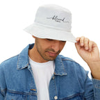 Man wearing white Blessed Bucket Hat with embroidered text