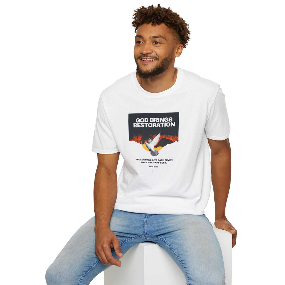 Man wearing white Restored by Grace T-Shirt with "God Brings Restoration" text and dove graphic, paired with light blue jeans