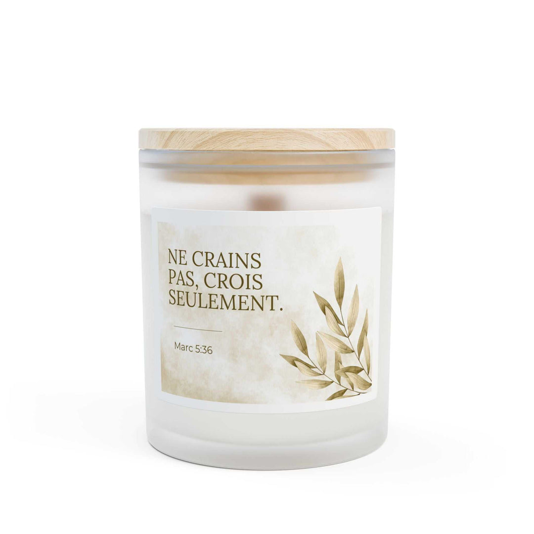 Frosted glass candle with wooden lid featuring French Mark 5:36 verse and natural off-white coconut soy wax