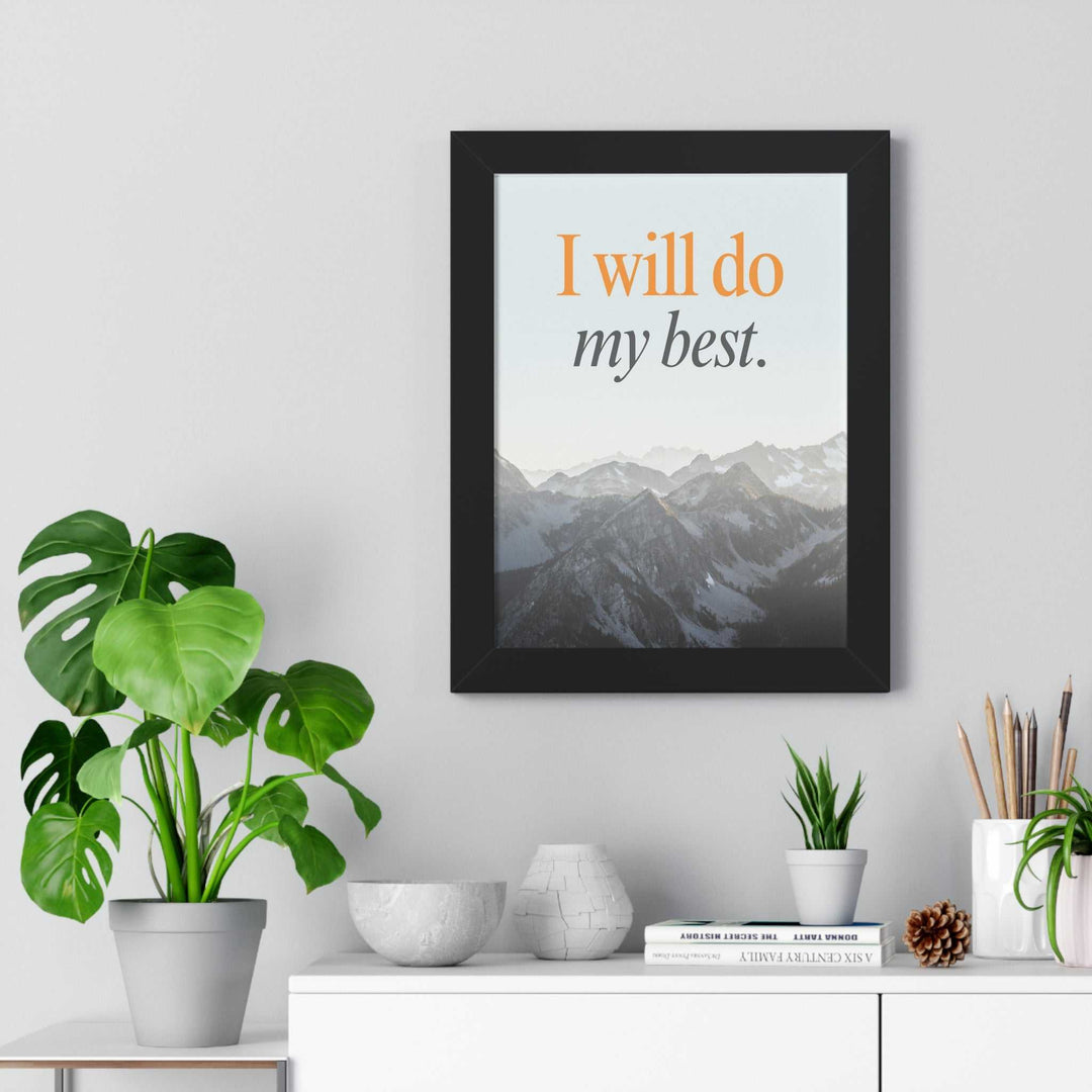 Inspirational "I will do my best" poster with mountain background in black frame displayed in modern minimalist room with plants and decor.