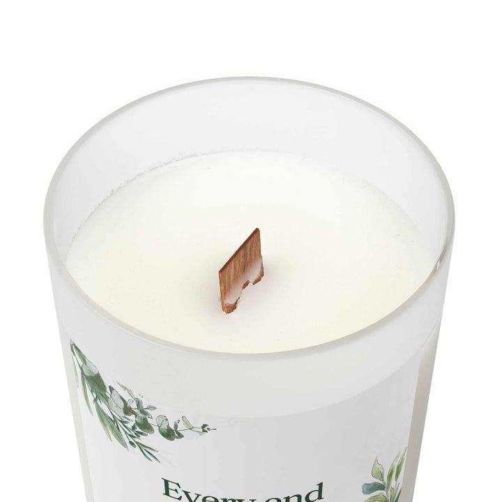 Natural off-white soy candle in frosted glass with wooden wick and maple lid for calming ambiance and fresh starts
