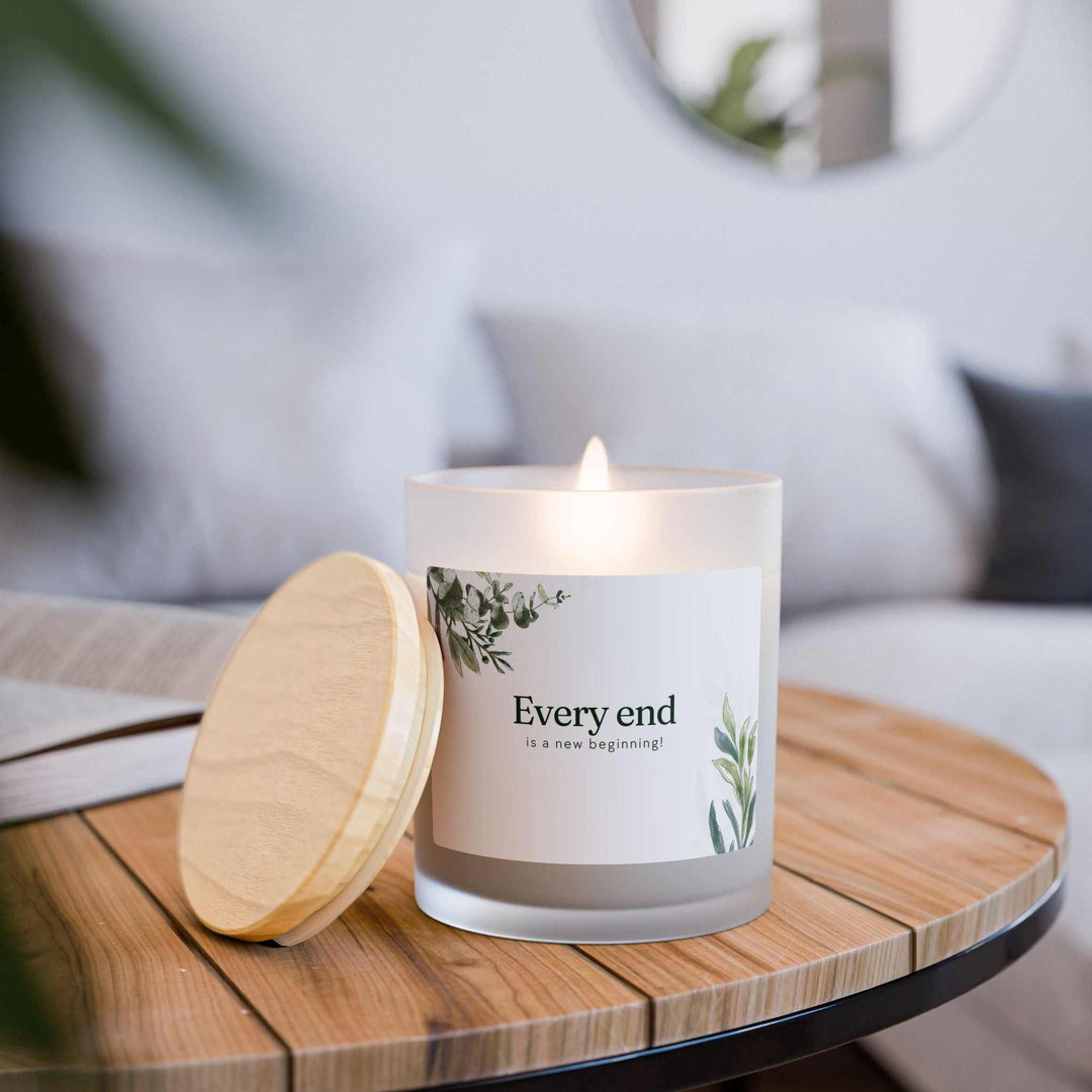 New Beginnings Glass Candle with wooden wick in frosted glass and raw maple lid, natural off-white coconut soy wax, 50-hour burn time.