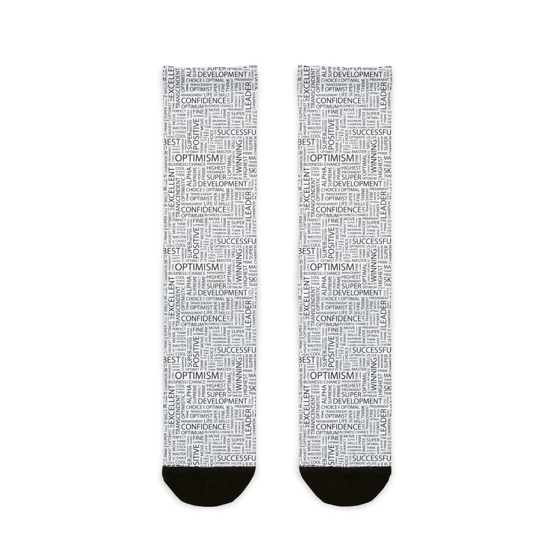 Pair of crew socks with positive motivational words printed