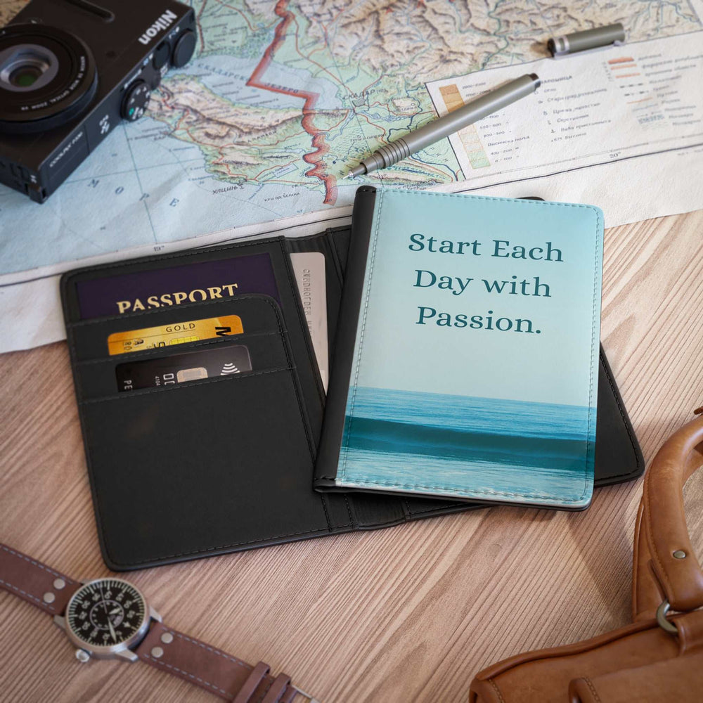 Black PU leather passport cover with "Start Each Day with Passion" print, RFID blocking, card and cash pockets, fits most passports including U.S.