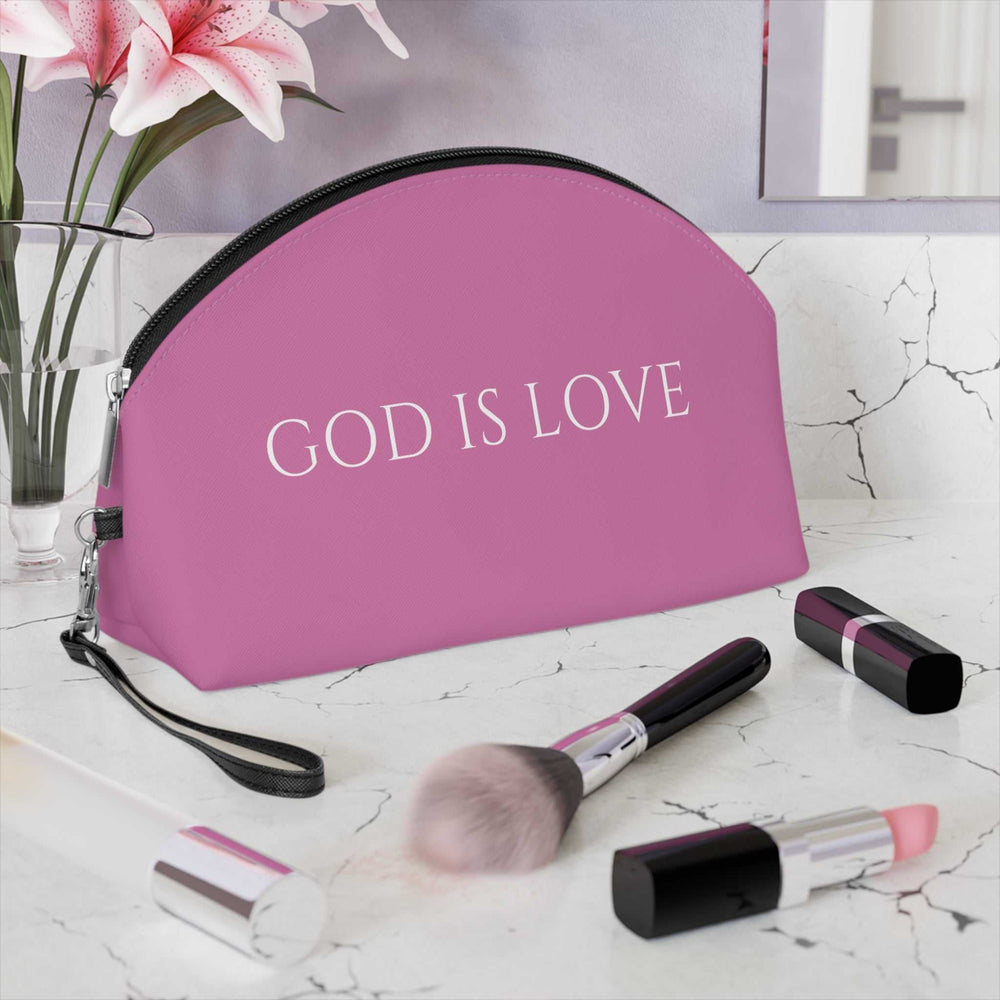 Pink "God Is Love" makeup bag with curved top
