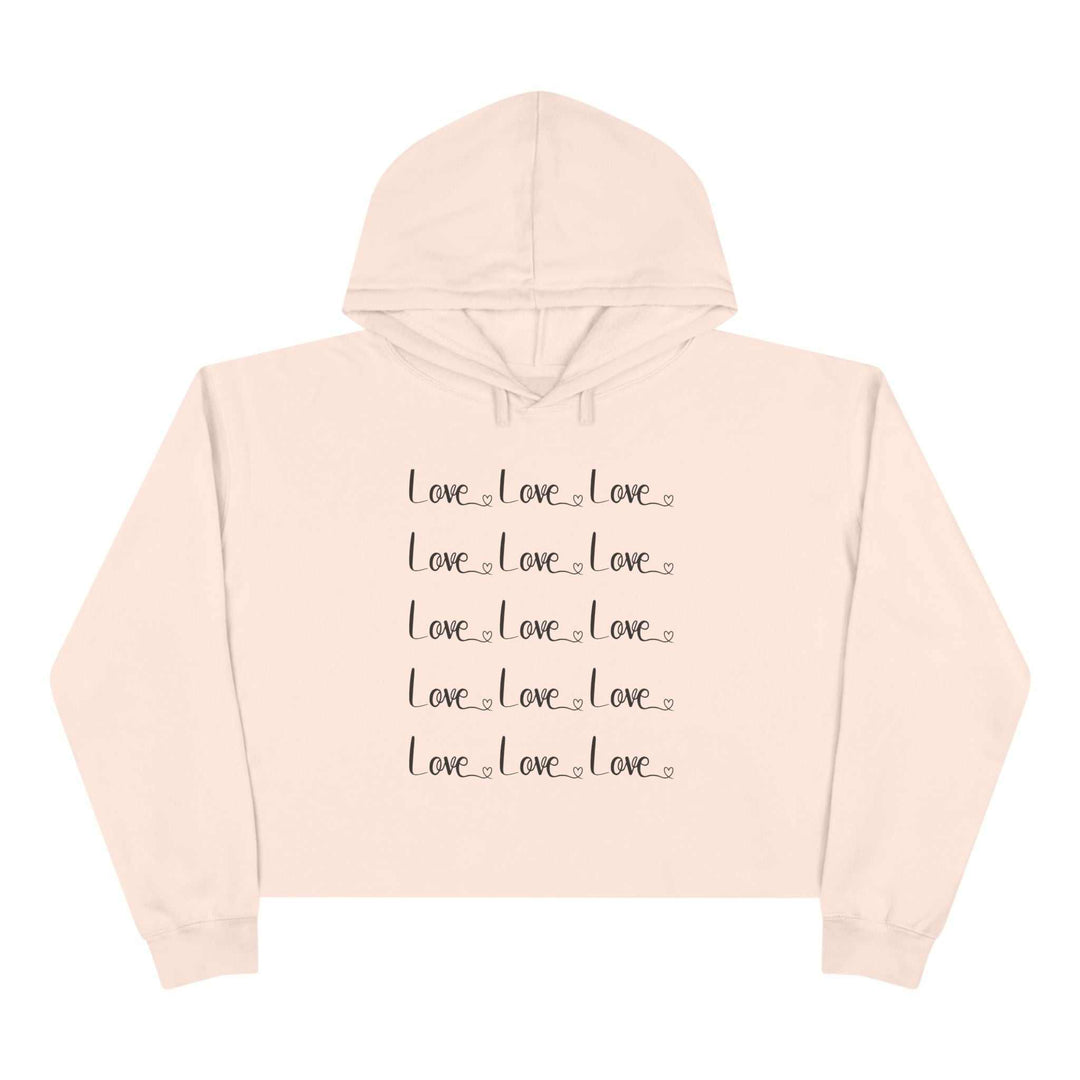 Pink Love Crop Hoodie with repeated black "Love" text design