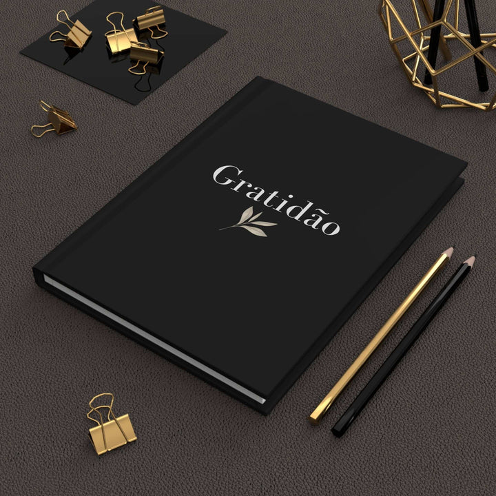 Black Gratidão Journal with matte finish and elegant gold leaf design, perfect for daily gratitude practice and journaling.