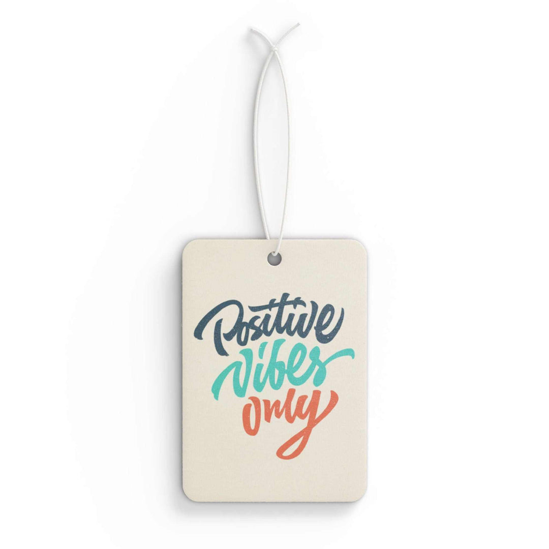 Positive Vibes Only car air freshener with motivational text