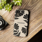 Purpose Over Distraction phone case with black floral design and motivational text on beige background