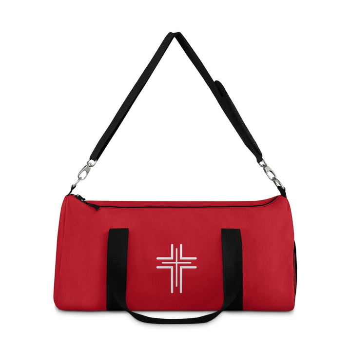 Red Christian Cross duffel bag with black adjustable shoulder strap