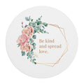 Round mouse pad with pink floral design and "Be kind and spread love" message
