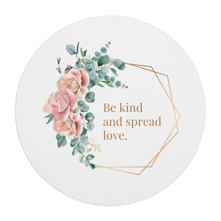 Round mouse pad with floral design and "Be kind and spread love" message in gold lettering