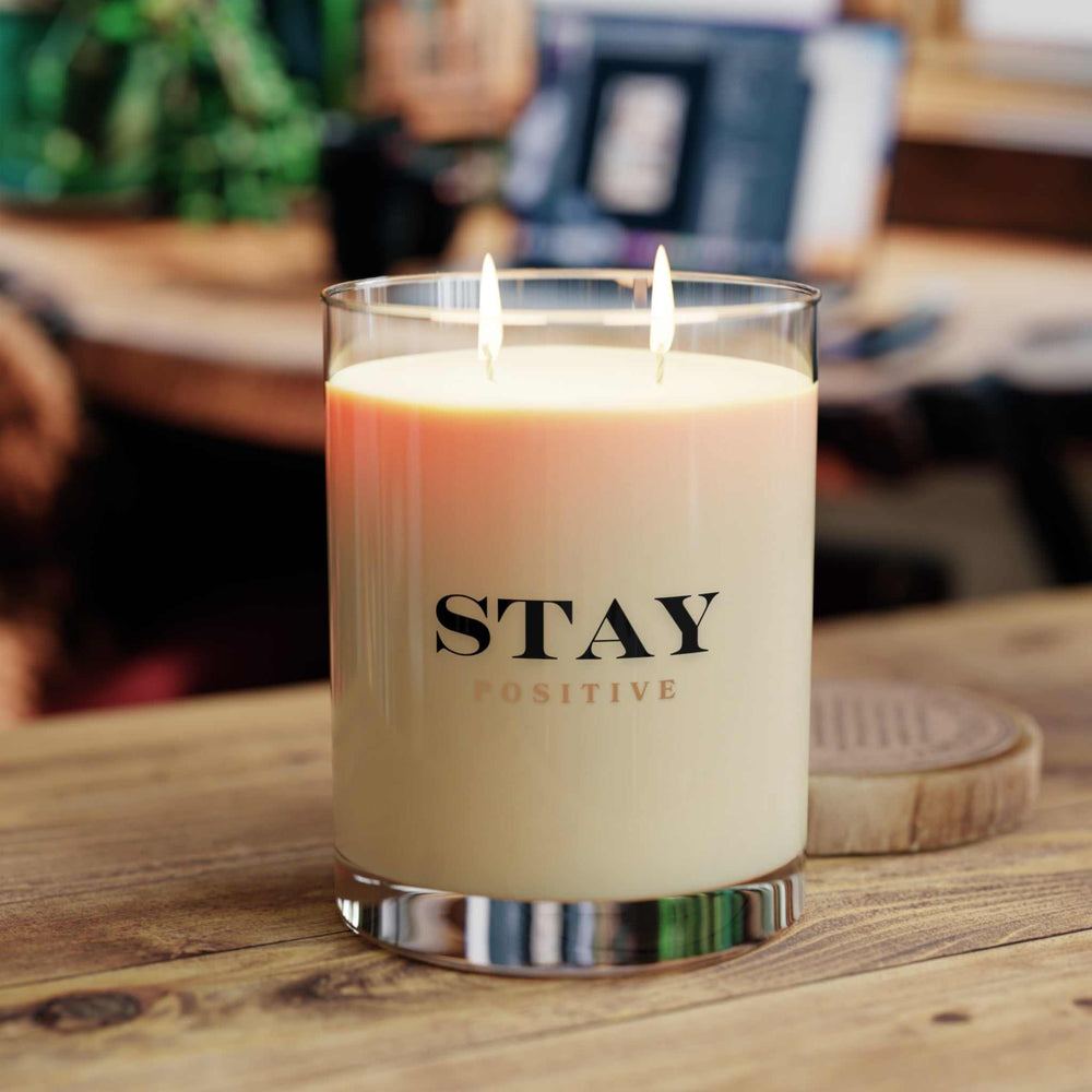 Stay Positive scented soy wax candle with two wicks in clear glass jar and uplifting message.