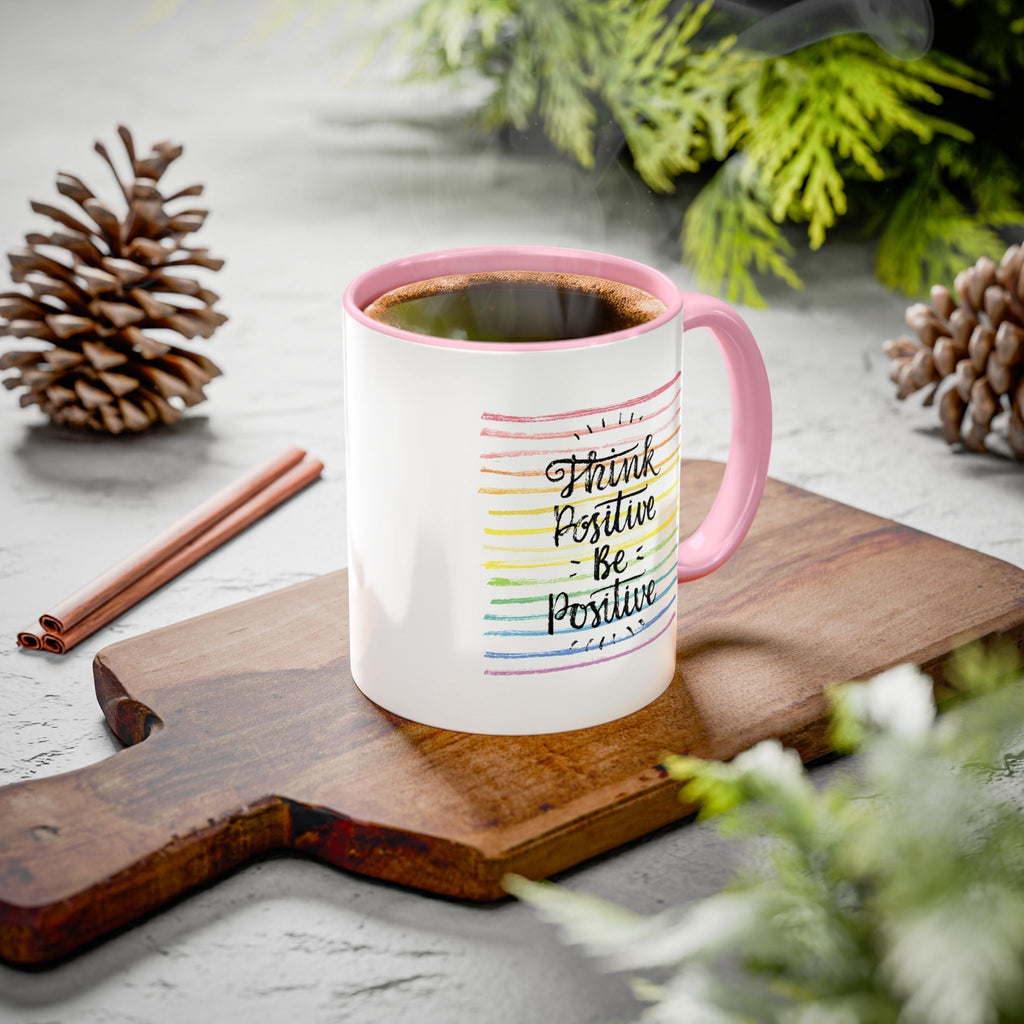 Think Positive Mug with pink handle and colorful text