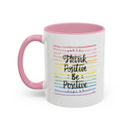 Think Positive Mug with pink handle and interior, rainbow stripes