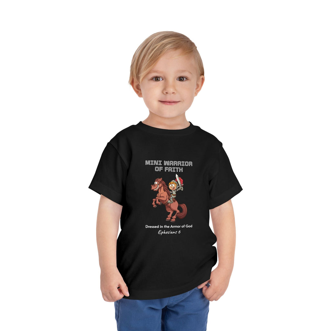 Child wearing black Warrior of Faith T-Shirt with horse warrior graphic and faith message