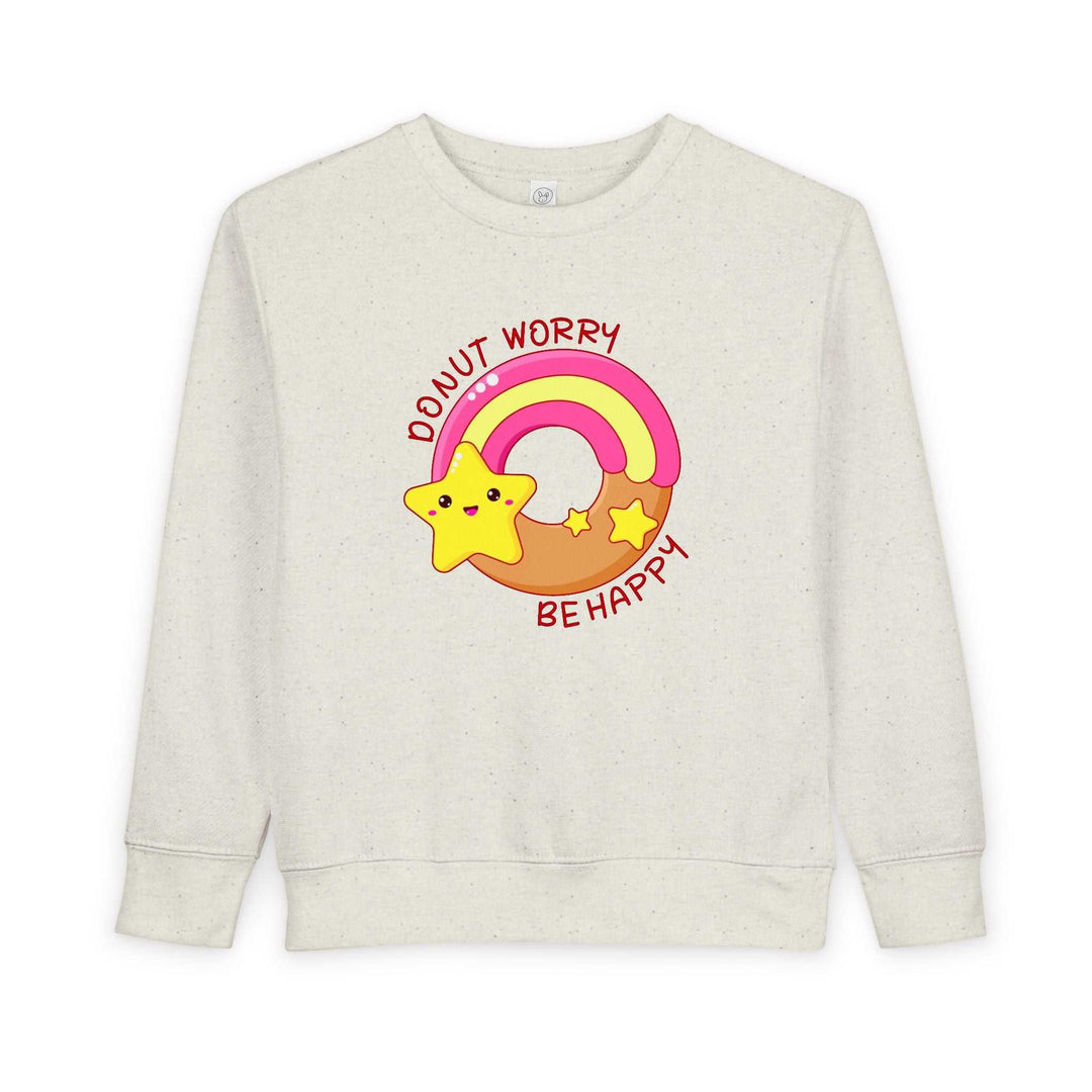 Toddler sweatshirt with "Donut Worry Be Happy" text