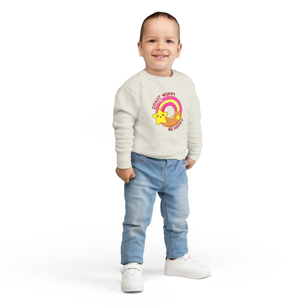 Toddler wearing Donut Worry Toddler Sweatshirt with rainbow