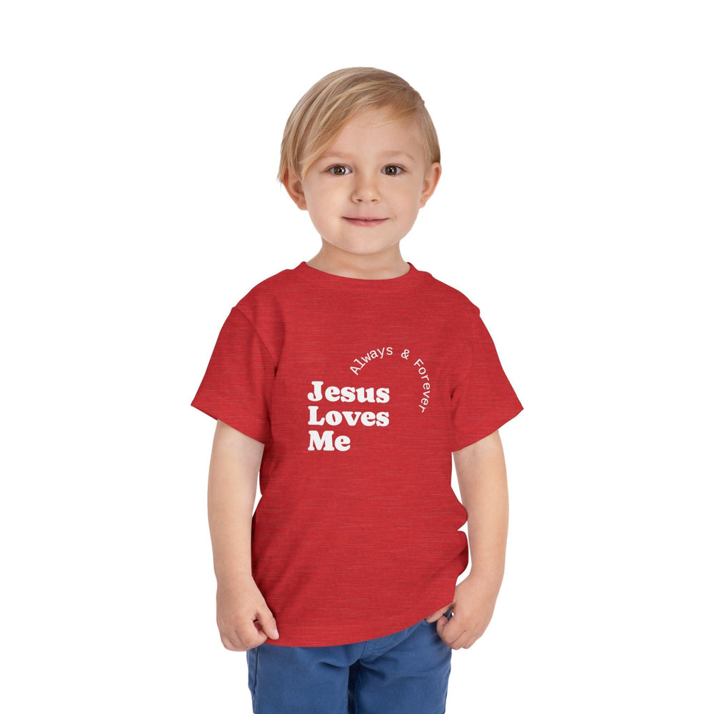 Young boy wearing a red "Jesus Loves Me" T-Shirt with white text, made of soft, lightweight cotton.
