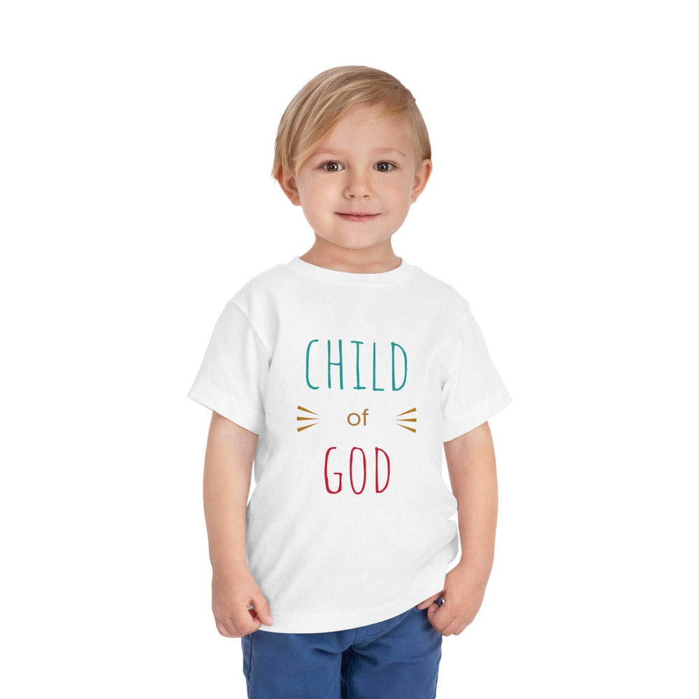 Child wearing a white "Child of God" T-Shirt made from soft, lightweight cotton fabric