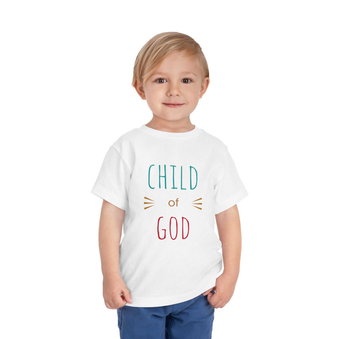 Child wearing a white "Child of God" T-Shirt made from soft, lightweight cotton fabric