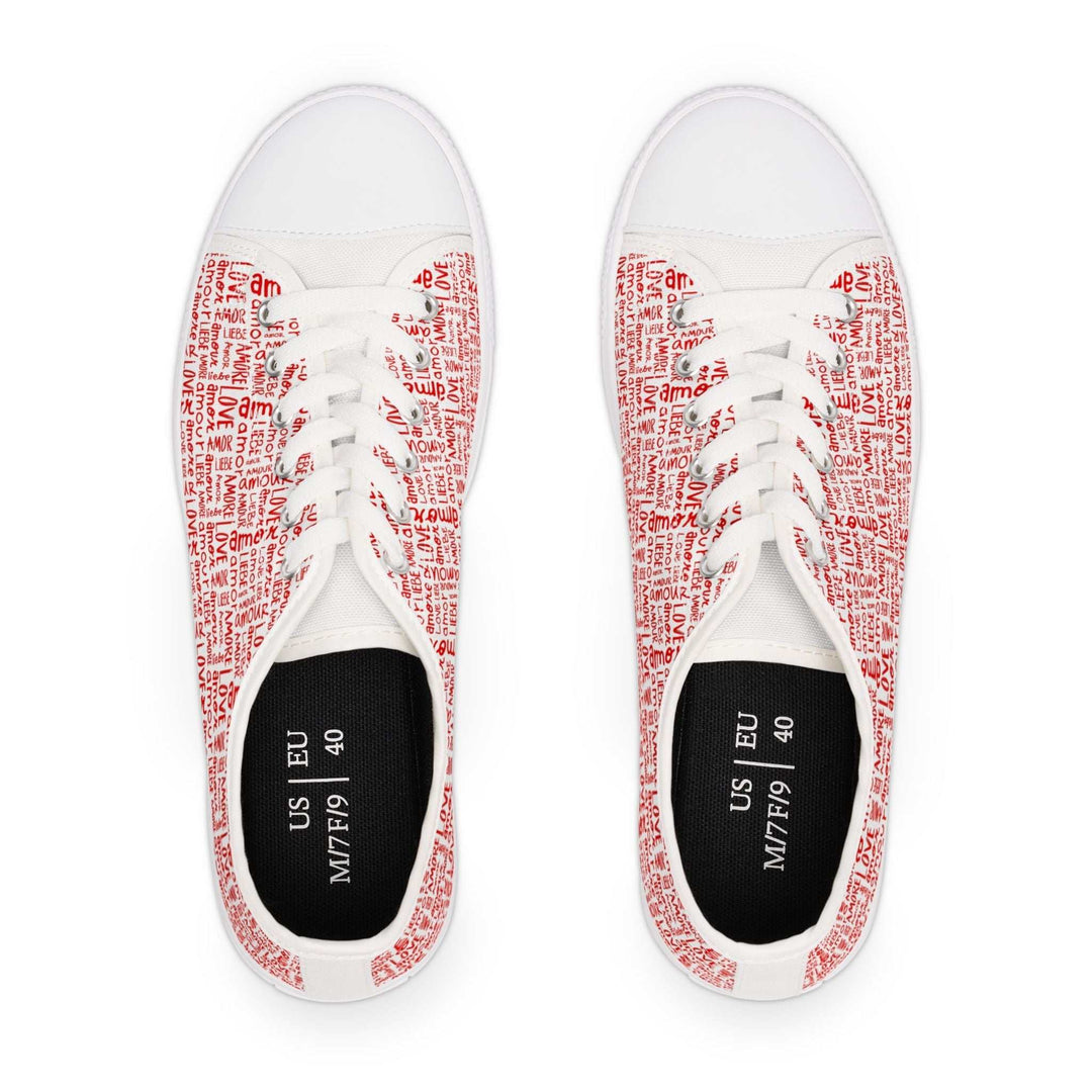 Top view of women's red love sneakers with white sole and red text