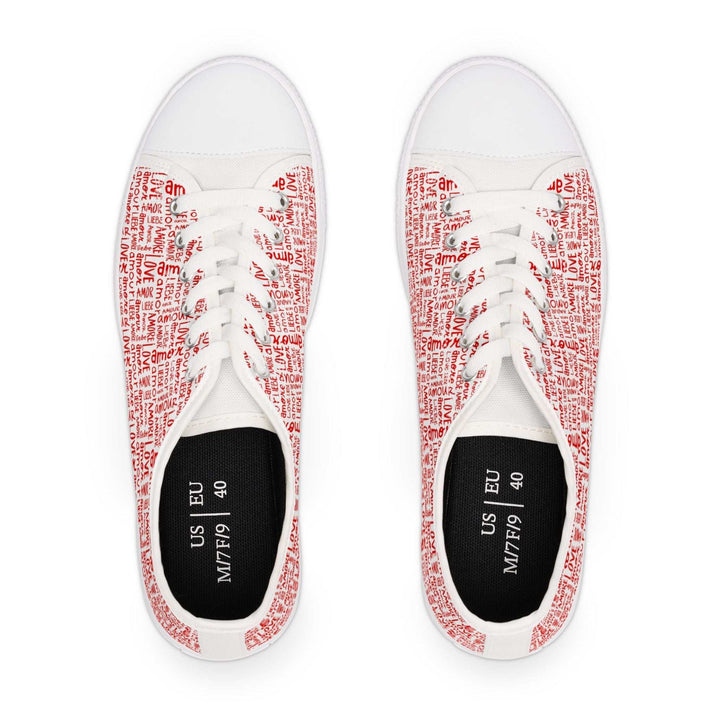Top view of women's red love sneakers with white sole and red text