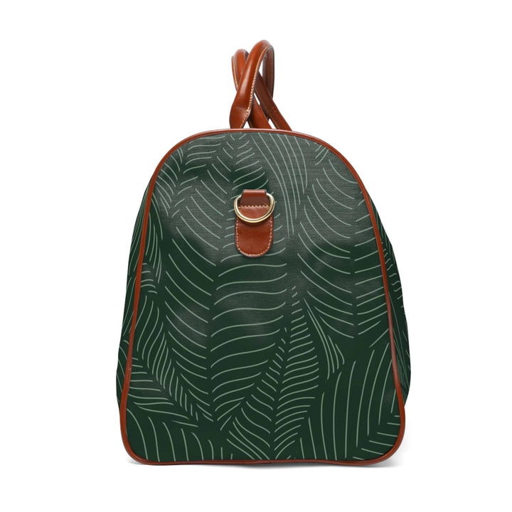 Tropical travel bag with green leaf print, brown PU leather handles