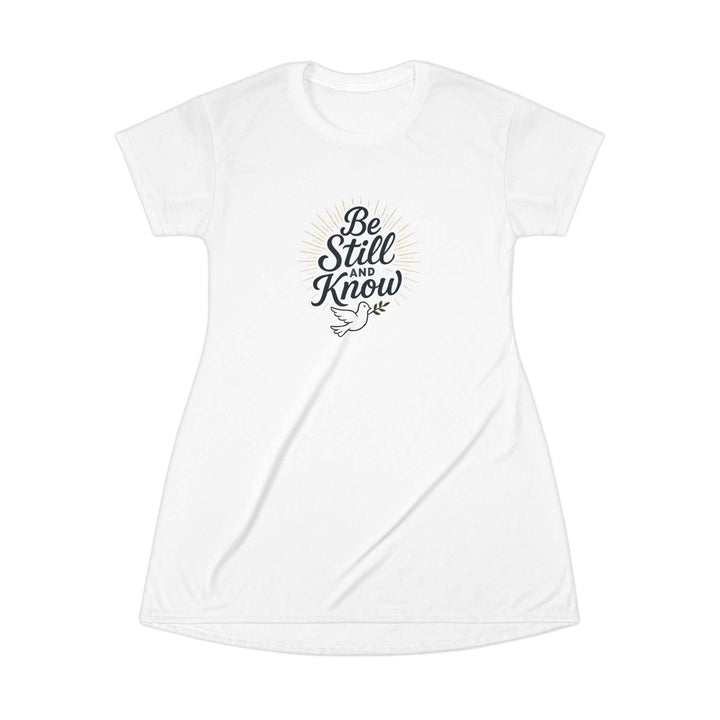 White Be Still T-Shirt Dress with dove graphic and motivational text
