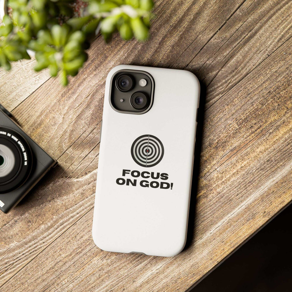 White Faith Focus phone case with "FOCUS ON GOD!" text and target design, durable lightweight protective cover for smartphone