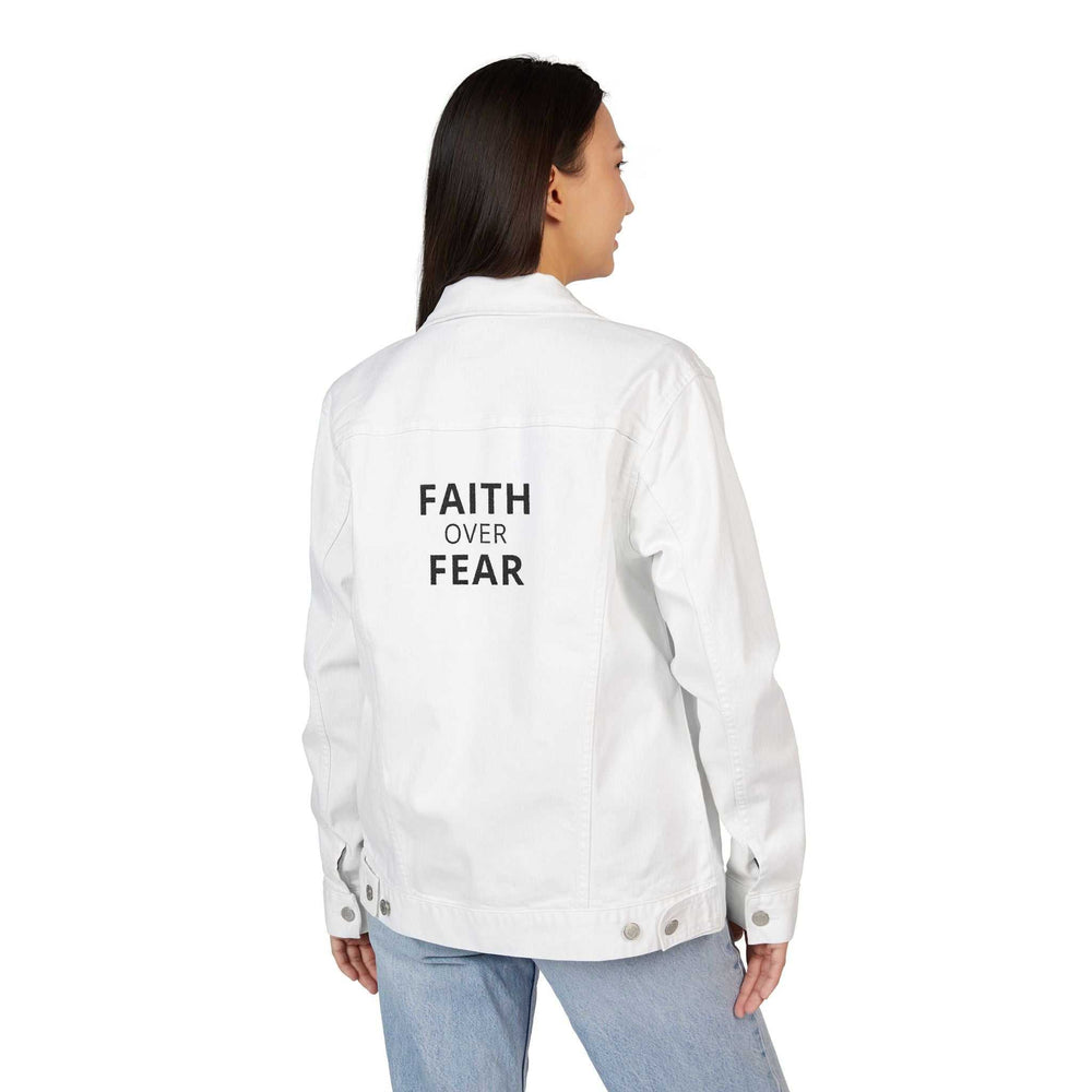 Woman wearing white Faith Over Fear denim jacket with chest pockets and button details, shown from back