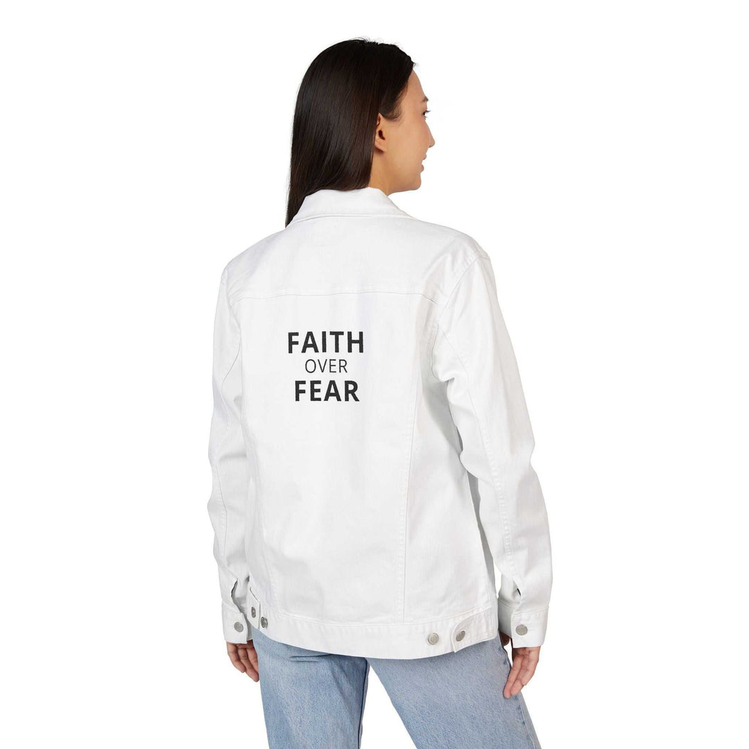 Woman wearing white Faith Over Fear denim jacket with chest pockets and button details, shown from back