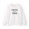 White Faith Over Fear sweatshirt with bold black text and classic fit design