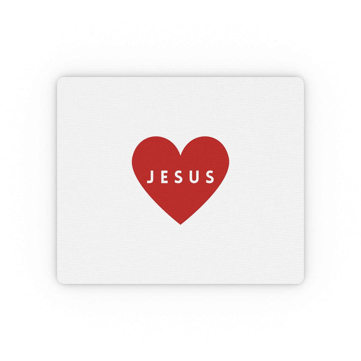White mouse pad with red heart and the word "JESUS" in the center, smooth cloth surface and non-slip rubber backing.