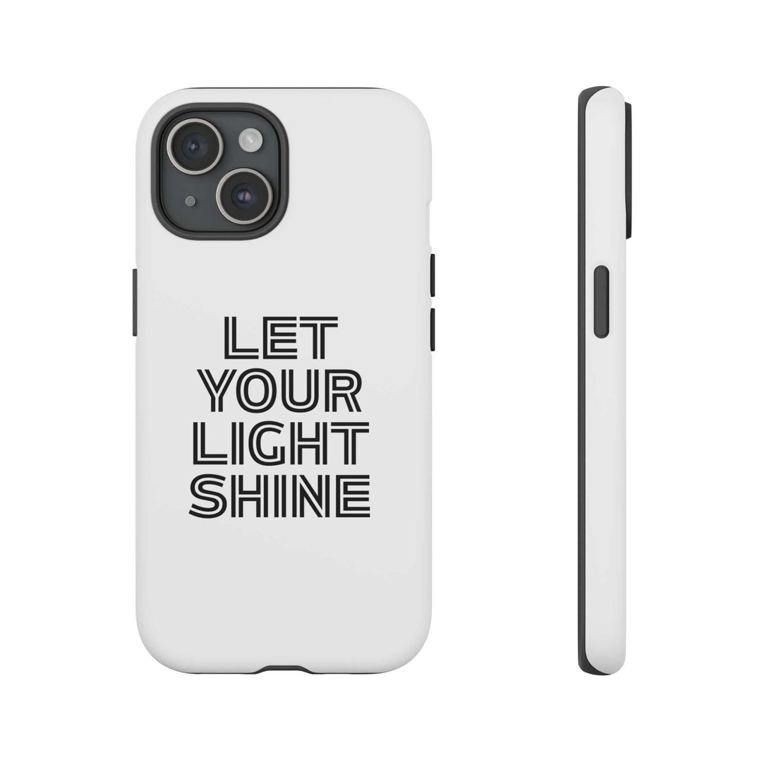 White durable phone case with "Let Your Light Shine" text and matte finish, designed for daily use and wireless charging compatibility.
