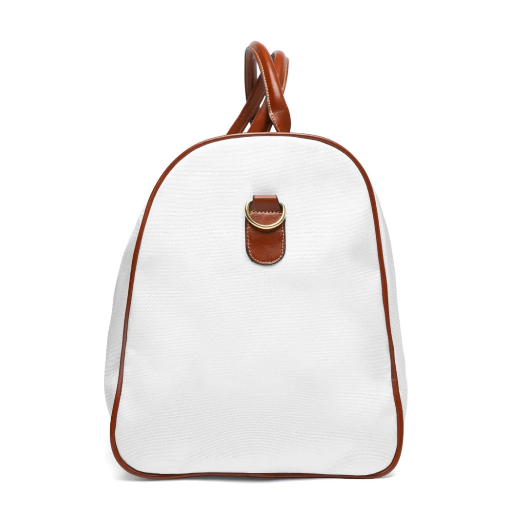 White and brown Jesus is King travel bag with leather handles and gold zipper
