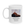 White ceramic mug with inspirational Bible verse and cross on mountain design