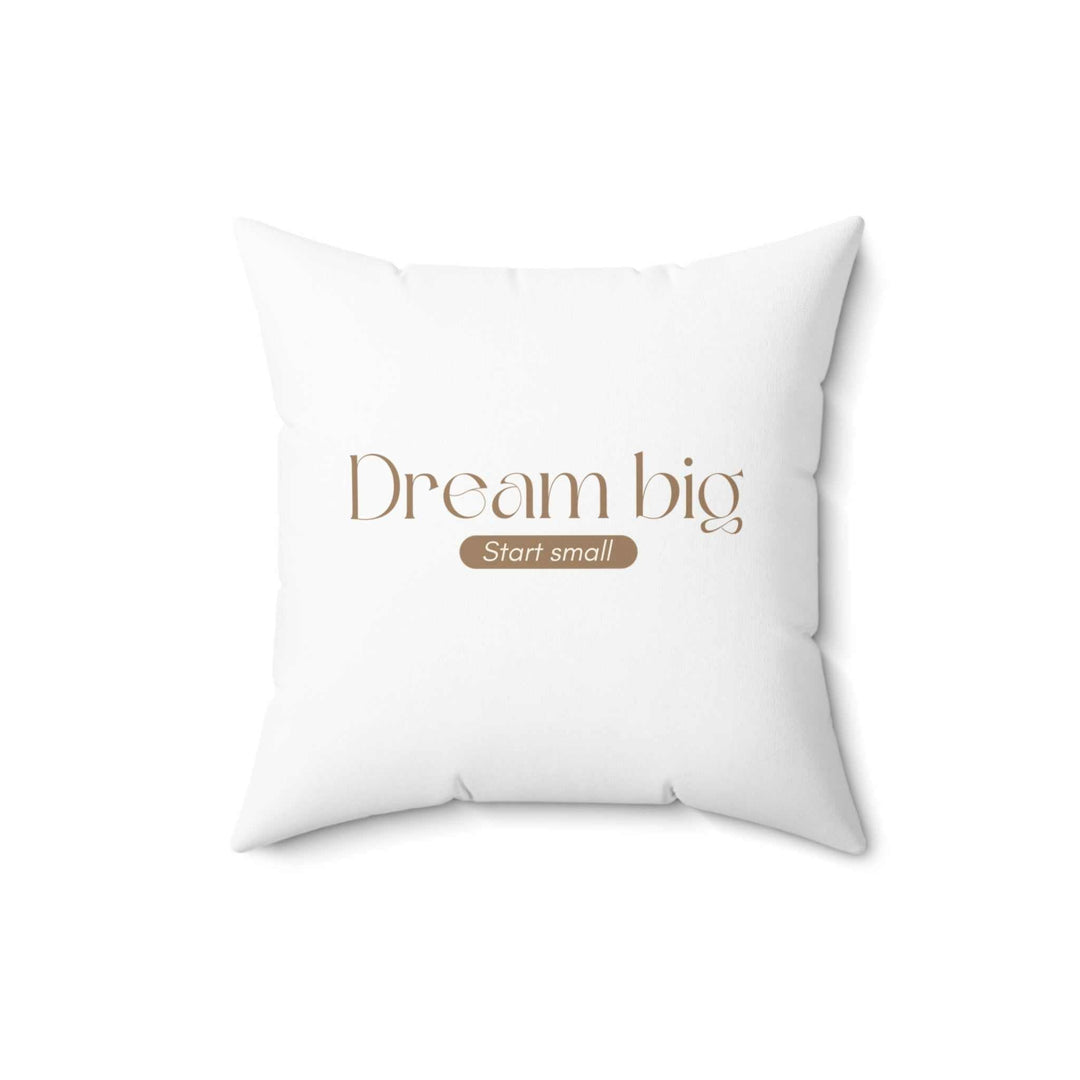 White decorative pillow with "Dream big Start small" motivational text in beige
