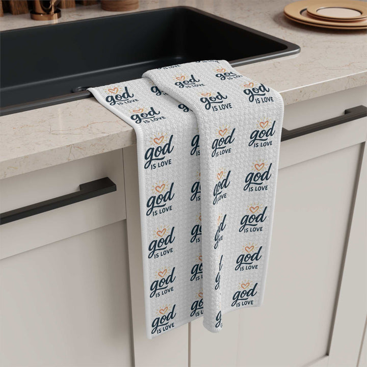 White microfiber tea towel with "God is Love" text pattern