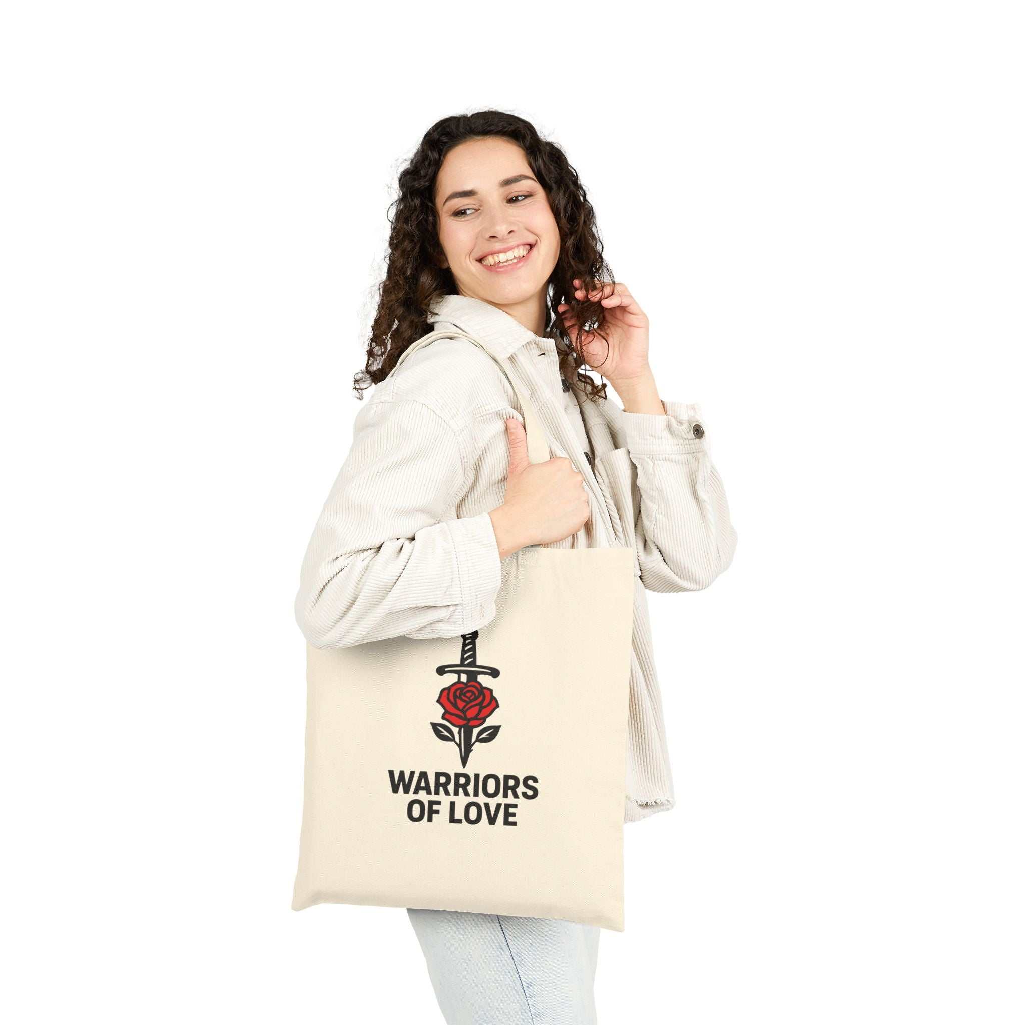 Woman carrying Warriors of Love Tote Bag
