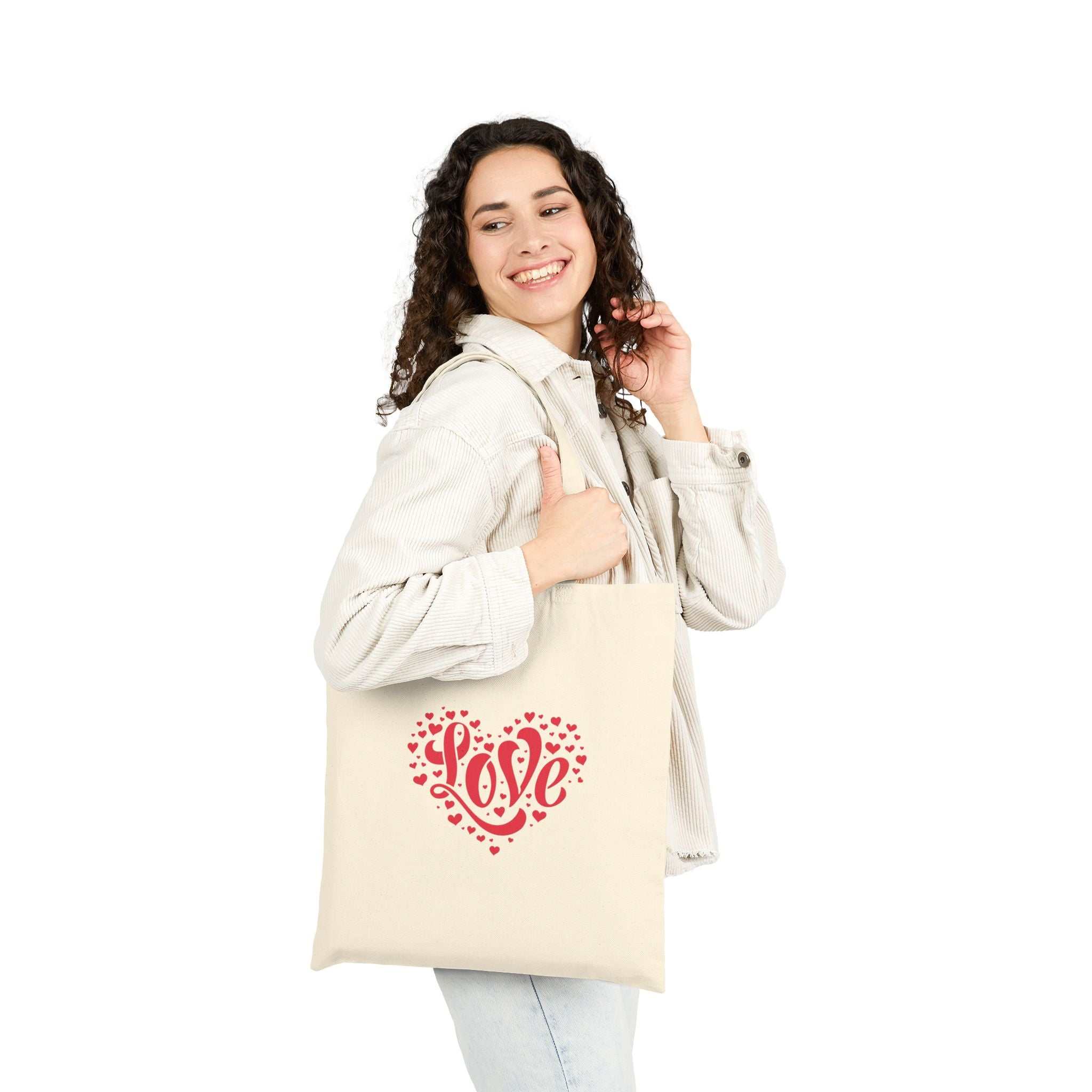 Woman carrying a 100% cotton Love Tote Bag