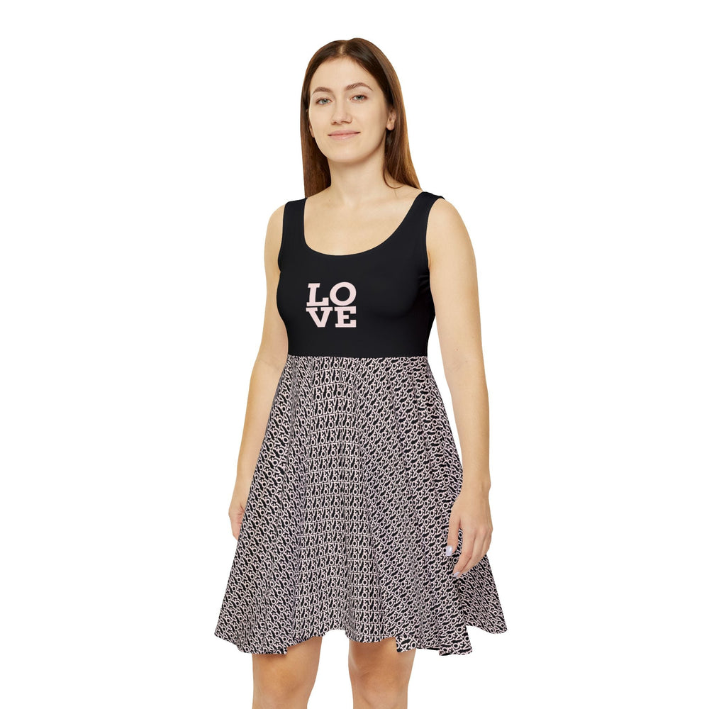 Woman wearing a black and patterned Love Skater Dress